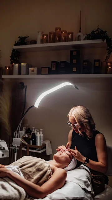 Heather providing a facial in her private Tucson skincare studio