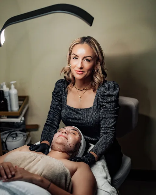 Heather Witherell with a facial client at her Tucson esthetics studio