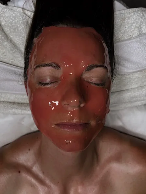 Front view of a customized Hydrojelly mask during a facial in Tucson