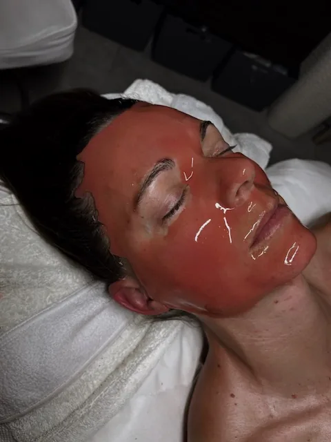 Side view of a customized Hydrojelly mask during a facial in Tucson